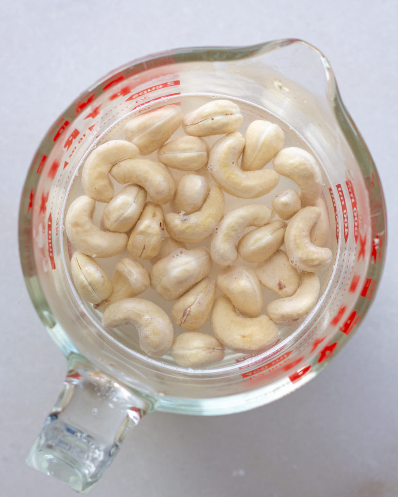 Cashews soaking in warm water