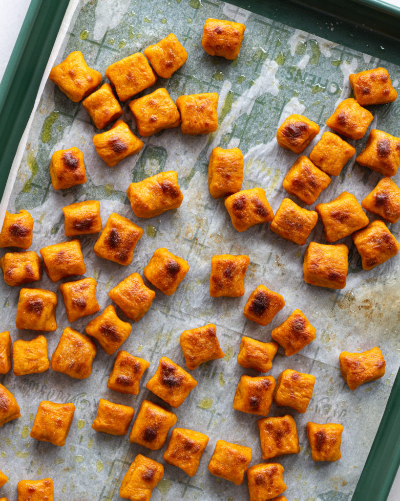 Homemade Sweet Potato Gnocchi, baked and crispy on a sheet pan