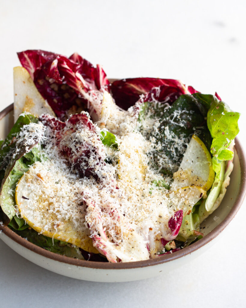 finished Chicories with Pear Vinaigrette, Parmesan & Pecans