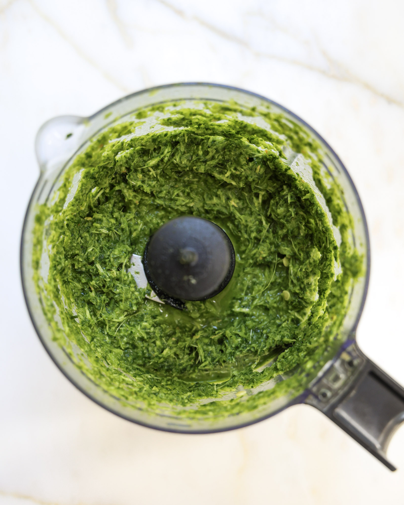 carrot top hot sauce ingredients blended in a food processor.