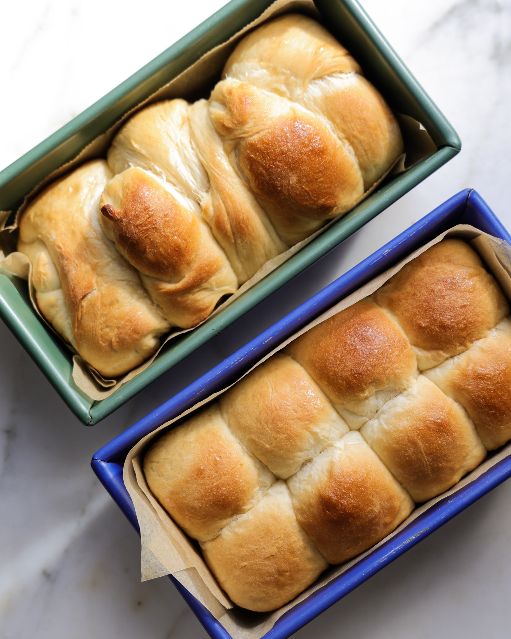 baked vegan brioche two ways: bun and braided loaf.