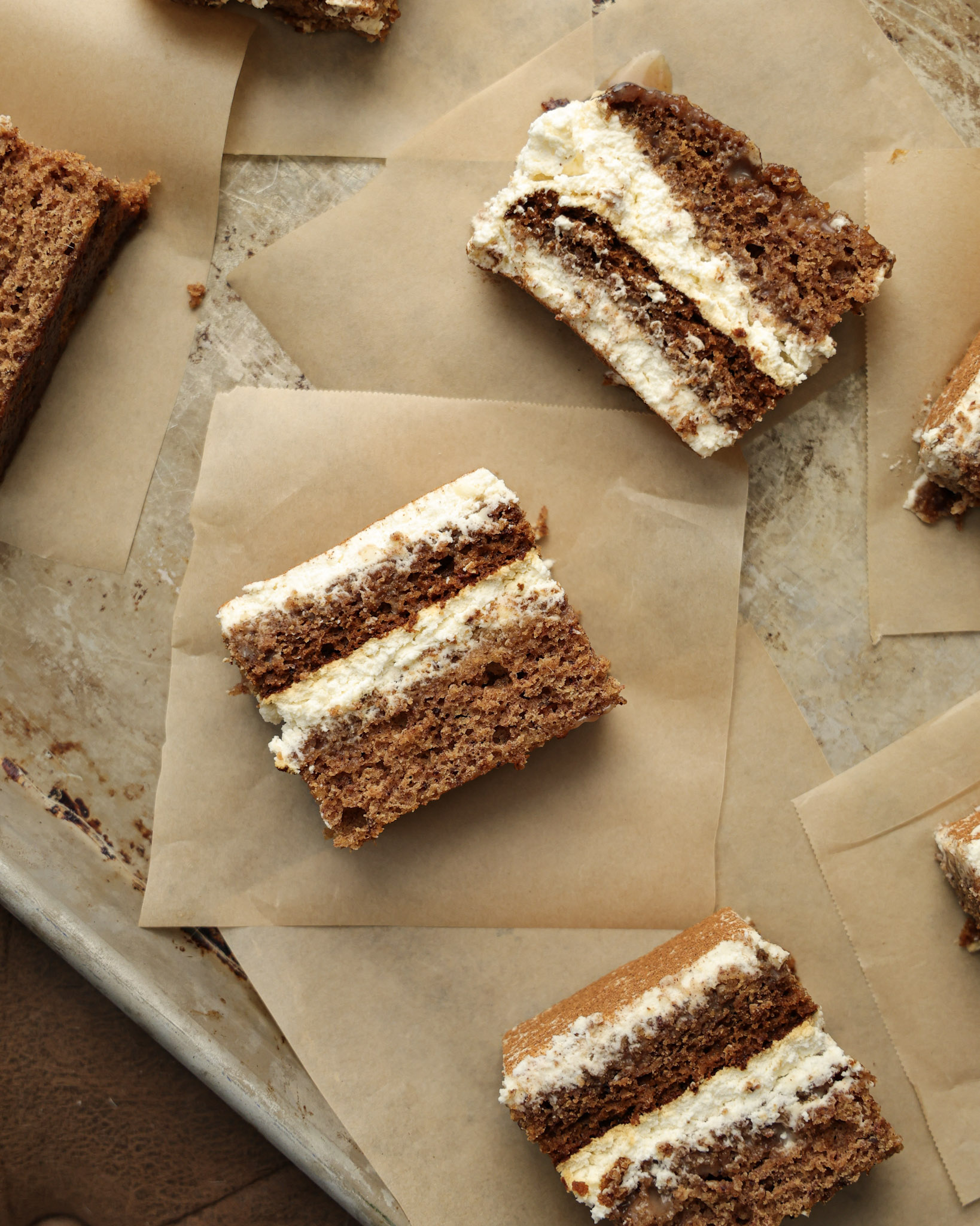 slices of sticky toffee tiramisu on parchment paper